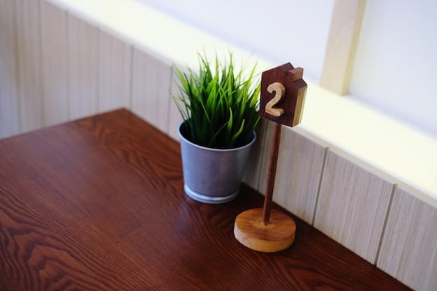 A wide shot of a completed DIY house number planter mounted next to a front door. The planter is made of stained wood and features large, easy-to-read house numbers. The planter is overflowing with a variety of flowers and greenery, creating a vibrant and eye-catching display.