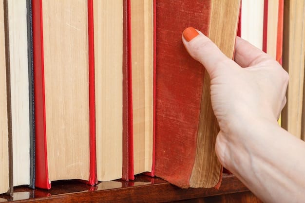 A close-up shot of a hand applying varnish to a newly built bookshelf, highlighting the smooth finish and attention to detail in the DIY process. The bookshelf is partially filled with books and decorations.